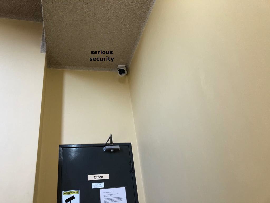 Internal camera positioned above a commercial entry — Serious Security gallery
